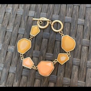 Orange & silver bracelet with toggle closure